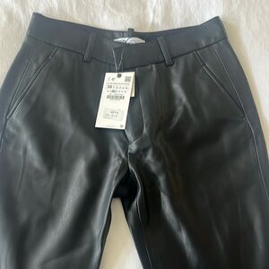 Ladies black faux leather pants. New never worn